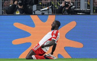 epa10957978 Munich's Dayot Upamecano celebrates after scoring the 0-1 goal during the German Bundesliga soccer match between Borussia Dortmund and FC Bayern Munich in Dortmund, Germany, 04 November 2023.  EPA/CHRISTOPHER NEUNDORF CONDITIONS - ATTENTION: The DFL regulations prohibit any use of photographs as image sequences and/or quasi-video.