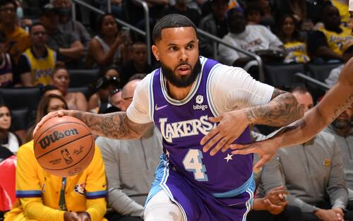 LOS ANGELES, CA - APRIL 8: D.J. Augustin #4 of the Los Angeles Lakers drives to the basket during the game against the Oklahoma City Thunder on April 8, 2022 at Crypto.Com Arena in Los Angeles, California. NOTE TO USER: User expressly acknowledges and agrees that, by downloading and/or using this Photograph, user is consenting to the terms and conditions of the Getty Images License Agreement. Mandatory Copyright Notice: Copyright 2022 NBAE (Photo by Adam Pantozzi/NBAE via Getty Images) 
