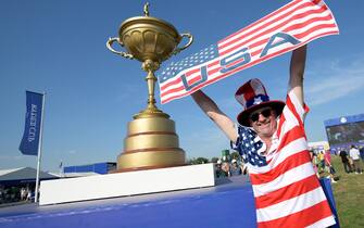 A United States fan waits for the start of the Ryder Cup opening ceremony at the Marco Simone Golf Club in Guidonia, near Rome, Italy, 28 September 2023. The 44th Ryder Cup matches between the US and Europe will be held in Italy from 29 September to 01 October 2023.   ANSA/ETTORE FERRARI