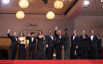 CANNES, FRANCE - MAY 18: (L-R) Producer Frank Marshall, Producer Kathleen Kennedy, Ethann Isidore, Phoebe Waller-Bridge, Director James Mangold, Harrison Ford, Shaunette RenÃ©e Wilson, Boyd Holbrook, Mads Mikkelson and Producer Simon Emanual attend the "Indiana Jones And The Dial Of Destiny" red carpet during the 76th annual Cannes film festival at Palais des Festivals on May 18, 2023 in Cannes, France. (Photo by Mike Coppola/Getty Images)