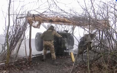 epa11255537 A still image taken from handout video provided by the Russian Defence ministry's press-service on 02 April 2024 shows troops operating a D-30 howitzer in the Belgorod region, Russia. Russian Defense Minister Sergei Shoigu said that Russian forces delivered 190 combined strikes and two major strikes on Ukrainian targets in March 2024.  EPA/RUSSIAN DEFENCE MINISTRY PRESS HANDOUT HANDOUT EDITORIAL USE ONLY/NO SALES HANDOUT EDITORIAL USE ONLY/NO SALES HANDOUT EDITORIAL USE ONLY/NO SALES