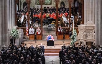 epa11815169 The flag-draped casket of former US President Jimmy Carter is seen after its arrival at National Cathedral before the state funeral, in Washington, DC, USA, 09 January 2025. Carter, the 39th US president, died at age 100 in his hometown of Plains, Georgia, on 29 December 2024.  EPA/HAIYUN JIANG/ POOL