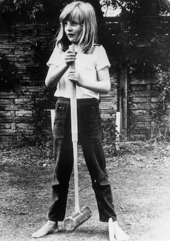 3430665 1970: Lady Diana Spencer (1961 - 1997) holding a croquet mallet during a game at Itchenor, West Sussex. (Photo by Central Press/Getty Images)