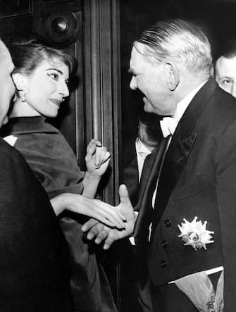 Jan. 1, 1955 - Paris, France - American-born Greek dramatic opera singer MARIA CALLAS remains an icon with an instantly recognizable voice. But she was also the first opera singer to be equipped with the ingredients of international celebrity: charisma, glamour, wealth, she had it all, together with the touches of scandal and tragedy that made her story so compelling. Since her time, every female opera singer has been measured against this powerful role model. PICTURED: Maria Callas with French president RENE COTY.    (Credit Image: © Keystone Press Agency/ZUMA Press Wire)