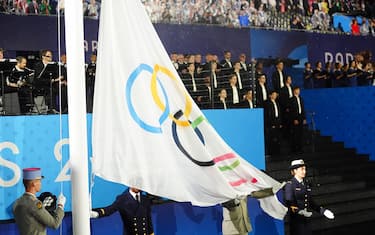 The Olympic flag is raised during the opening ceremony of the Paris 2024 Olympic Games at the Trocadero in Paris, in France. Picture date: Friday July 26, 2024.