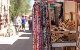 The colorful scarves at a souvenir stand in Khiva. Uzbekistan.