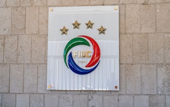 The logo of the Italian Football Federation (FIGC) on the wall at the headquarters in Via Gregorio Allegri