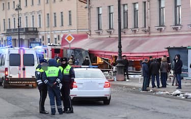 Russian police investigators inspect a damaged 'Street bar' cafe in a blast in Saint Petersburg on April 2, 2023. - A leading Russian military blogger was killed on April 2, 2023 in an explosion at a cafe in Russia's second-largest city of Saint Petersburg, the interior ministry said. "One person was killed in the incident. He was military correspondent Vladlen Tatarsky," the ministry said on Telegram. (Photo by Olga MALTSEVA / AFP) (Photo by OLGA MALTSEVA/AFP via Getty Images)