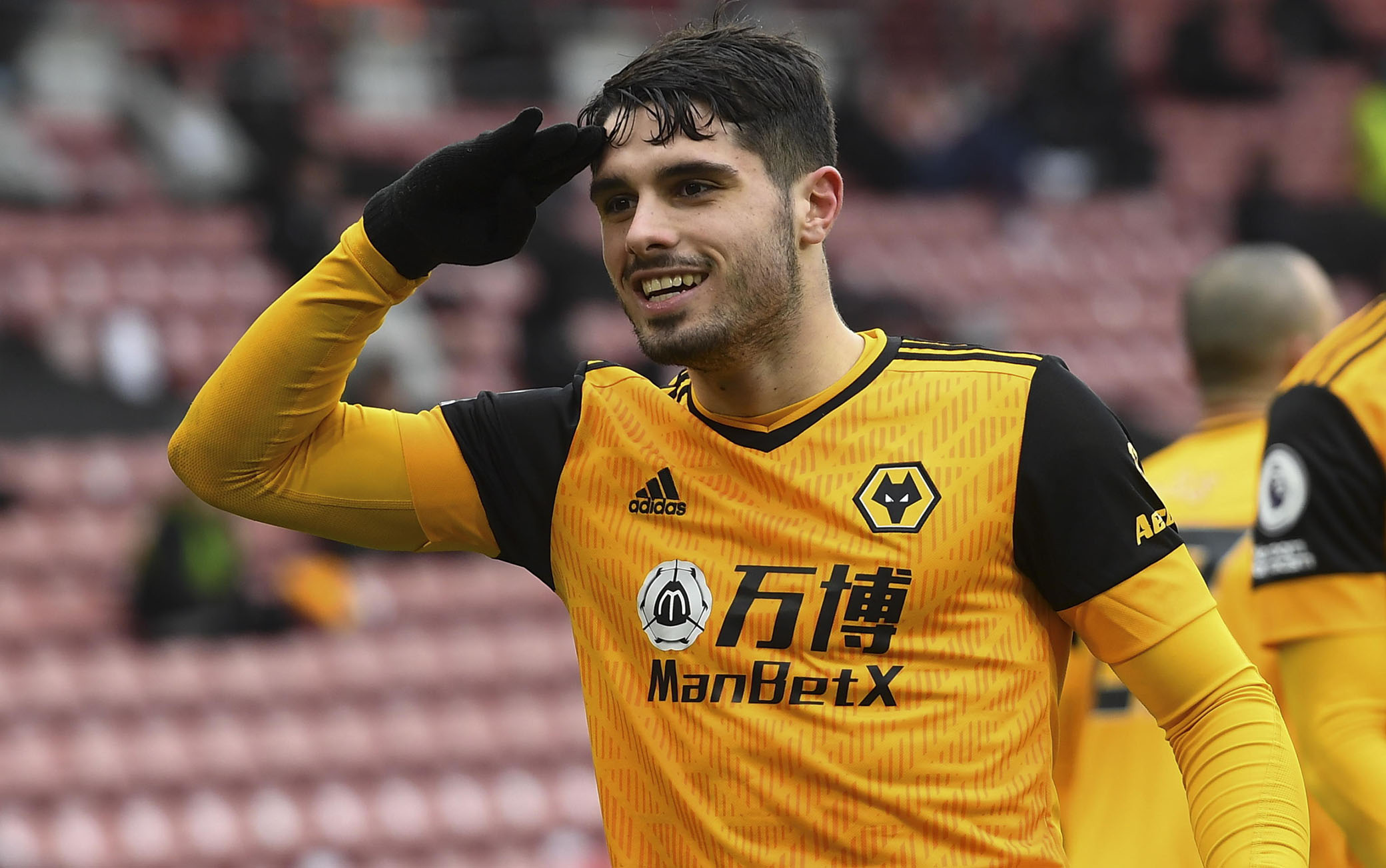 epa09012223 Pedro Neto of Wolverhampton celebrates after scoring the 2-1 lead during the English Premier League soccer match between Southampton FC and Wolverhampton Wanderers in Southampton, Britain, 14 February 2021.  EPA/Andy Rain / POOL EDITORIAL USE ONLY. No use with unauthorized audio, video, data, fixture lists, club/league logos or 'live' services. Online in-match use limited to 120 images, no video emulation. No use in betting, games or single club/league/player publications.