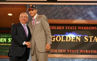 NEW YORK - JUNE 25:  Stephen Curry shakes hands with NBA Commissioner David Stern after being selected seventh by the Golden State Warriors during the 2009 NBA Draft on June 25, 2009 at the WaMu Theatre at Madison Square Garden in New York City. NOTE TO USER: User expressly acknowledges and agrees that, by downloading and/or using this Photograph, user is consenting to the terms and conditions of the Getty Images License Agreement. Mandatory Copyright Notice: Copyright 2009 NBAE (Photo by Nathaniel S. Butler/NBAE via Getty Images)