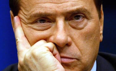epa10686559 (FILE) Italian Prime Minister Silvio Berlusconi during a news conference in Brussels, Belgium, 11 December 2003 (reissued 12 June 2023). Silvio Berlusconi has died at the age of 86 on 12 June 2023 at San Raffaele hospital in Milan, where he was hospitalized again since last 09 June, sources close to his family told ANSA. The Italian media tycoon and Forza Italia (FI) party founder served as prime minister of Italy in four governments.  EPA/OLIVIER HOSLET