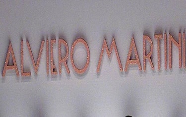 20000930-MILANO-CRO-MODA: LE FORTUNE DEL CHIRURGO ESTETICO INIZIANO IN PASSERELLA-Le modelle di Alviero Martini oggi durante le sfilate di Milano Collezioni primavera-estate 2001.   CARLO FERRARO-ANSA-TO
