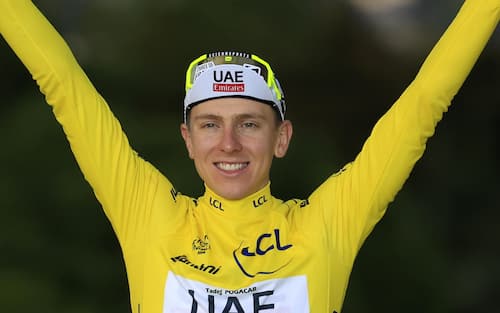 epa11490678 Yellow Jersey and Tour de France overall winner Slovenian rider Tadej Pogacar of UAE Team Emirates celebrates on the podium after winning the 21st and final stage of the 2024 Tour de France cycling race over 33km Individual time-trial (ITT) from Monaco to Nice, 21 July 2024.  EPA/SEBASTIEN NOGIER