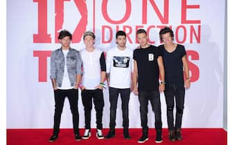 One Direction (left to right) Louis Tomlinson, Niall Horan, Zayn Malik, Liam Payne and Harry Styles are seen at a photocall to promote their new film This Is Us at the Sky Studios, London.