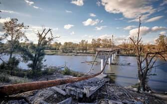 epa10222298 A damaged bridge near the Sviatohirsk Lavra (cave monastery) in Sviatohirsk, Donetsk area, Ukraine, 03 October 2022 (issued 04 October 2022). Ukrainian forces recaptured the town of Sviatohirsk from Russian troops in September 2022. According to Ukrainian authorities, the major Orthodox Christian monastery of Sviatohirsk Lavra was damaged during Russian shelling on the town in June 2022. Russian troops entered Ukraine on 24 February 2022 starting a conflict that has provoked destruction and a humanitarian crisis.  EPA/YEVGEN HONCHARENKO