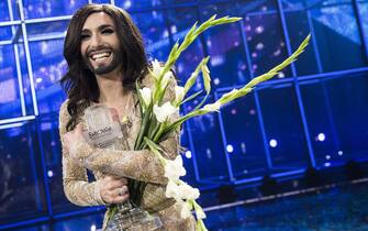  Conchita Wurst representing Austria poses with the trophy after winning the Eurovision Song Contest 2014 Grand Final in Copenhagen, Denmark, 10 May  2014.  ANSA/FLINDT MOGENS / POOL DENMARK OUT