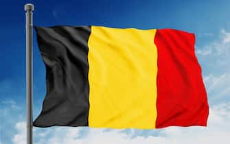 Belgium flag isolated on blue sky