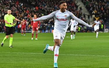 Salzburg's Austrian forward Chikwubuike Adamu celebrates scoring the opening goal during the UEFA Champions League last-16, first-leg football match RB Salzburg v FC Bayern Munich in Salzburg, Austria on February 16, 2022. (Photo by KERSTIN JOENSSON / AFP) (Photo by KERSTIN JOENSSON/AFP via Getty Images)