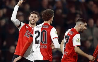 epa11212082 Santiago Gimenez of Feyenoord (L) celebrates the 2-0 goal with his teammates Mats Wieffer (C) and Luka Ivanusec during the Dutch Eredivisie match between Feyenoord and Heracles Almelo, in Rotterdam, the Netherlands, 10 March 2024.  EPA/MAURICE VAN STEEN