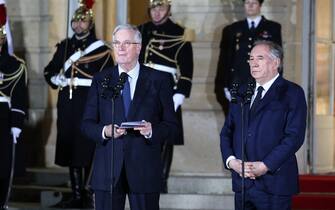 French outgoing Prime Minister Michel Barnier and newly appointed Prime minister Francois Bayrou during the handover ceremony in the courtyard of the Hotel Matignon, French Prime ministers' official residence, in Paris, France on December 13, 2024. France's President Emmanuel Macron appointed France's centrist Democratic Movement (MoDem) party leader and High Commissioner for Planning Francois Bayrou as Prime Minister after days of deadlock over finding a candidate to replace Michel Barnier, whose ousting by parliament pushed France into a fresh crisis. Photo by Raphael Lafargue/ABACAPRESS.COM