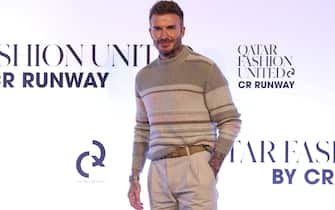 epa10368807 Former English international David Beckham arrives for the Qatar Fashion United by CR Runway fashion show at the 974 Stadium in Doha, Qatar, 16 December 2022.  EPA/MARTIN DIVISEK