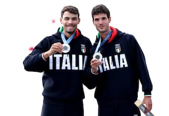 PARIS, FRANCE - AUGUST 02: Silver medalists Stefano Oppo and Gabriel Soares of Team Italy celebrate on the podium at the Rowing Lightweight Men's Double Sculls medal ceremony on day seven of the Olympic Games Paris 2024 at Vaires-Sur-Marne Nautical Stadium on August 02, 2024 in Paris, France. (Photo by Alex Davidson/Getty Images)