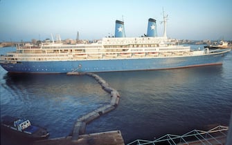 (FILES) A picture taken 10 October 1985 shows the Italian cruise ship Achille Lauro docked in Port Said. The US capture of Mohammad Abbas, known as Abu Abbas, the Palestinian mastermind of the 1985 Achille Lauro hijacking boosted Washington's case against Saddam Hussein's Iraq, as Iraqis began the tortuous process of replacing the regime toppled a week ago.  EPA PHOTO