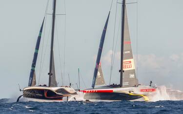 epa11632395 Teams INEOS Britannia (L) and Prada Luna Rossa Pirelli (L) compete during Day 3 of the 2024 Louis Vuitton Cup final in Barcelona, Spain, 29 September 2024. The winner of the Louis Vuitton Cup sailing competition determines the challenger in the 37th America's Cup to be held in October.  EPA/Quique Garcia