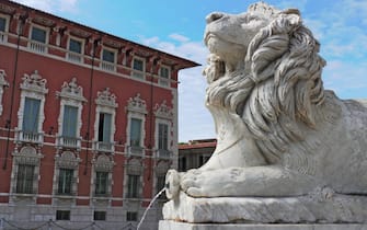 Stone Lion in front of Massa Town Hall