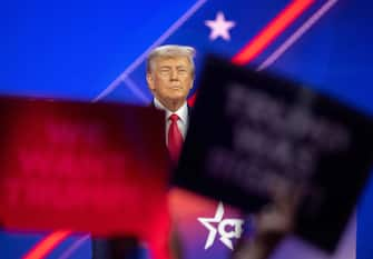 (FILES) Former US President and 2024 presidential hopeful Donald Trump arrives to speak during the 2023 Conservative Political Action Coalition (CPAC) Conference in National Harbor, Maryland, on March 4, 2023. Donald Trump was indicted on August 1, 2023 over his efforts to overturn the results of the 2020 election -- the most serious legal threat yet to the former president as he campaigns to return to the White House. (Photo by ROBERTO SCHMIDT / AFP)