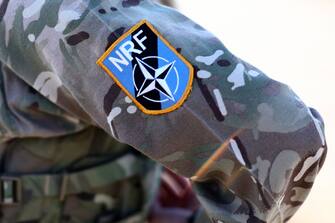 A soldier with a NATO Response Force patch during the North Atlantic Treaty Organization (NATO) Brilliant Jump 2024 exercise in Drawsko Pomorskie, Poland, on Monday, Feb. 26, 2024. Sweden cleared the final obstacle to gaining NATO membership in a move that will solidify the alliance's grip over Northern Europe and the Baltic region. Photographer: Liesa Johannssen/Bloomberg via Getty Images