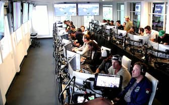 epa10581900 A frame grab from a handout livestream video released by SpaceX showing Elon Musk (C, front) in the command center during the launch of inaugural test flight of Starship on the second attempt at the SpaceX launch facility in Boca Chica, Texas, USA, 20 April 2023. The initial launch attempt was scrubbed on 17 April, due to a stuck valve.  EPA/SPACEX HANDOUT  HANDOUT EDITORIAL USE ONLY/NO SALES