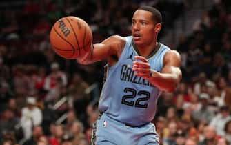 PORTLAND, OREGON - NOVEMBER 05: Desmond Bane #22 of the Memphis Grizzlies passes the ball during the fourth quarter against the Portland Trail Blazers at Moda Center on November 05, 2023 in Portland, Oregon. NOTE TO USER: User expressly acknowledges and agrees that, by downloading and or using this photograph, User is consenting to the terms and conditions of the Getty Images License Agreement.  (Photo by Amanda Loman/Getty Images)