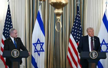 US President Donald Trump and Israeli Prime Minister Benjamin Netanyahu (L) participate in a press conference in the State Dining Room of the White House in Washington, DC on September 29, 2025. Gaza residents would not be forcibly displaced and President Donald Trump would head a transitional body under a peace plan released publicly Monday by the White House. (Photo by ANDREW CABALLERO-REYNOLDS / AFP)