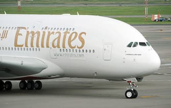 An Emirates Airline flight from Dubai lands on August 1, 2008 becoming the first commercial Airbus A380 jet to land in the United States at John F. Kennedy International Airport in New York. The A380 is the world's largest airliner with 49 percent more floor space and 35 percent more seating than the previous largest aircraft. AFP PHOTO/Stan HONDA (Photo credit should read STAN HONDA/AFP via Getty Images)