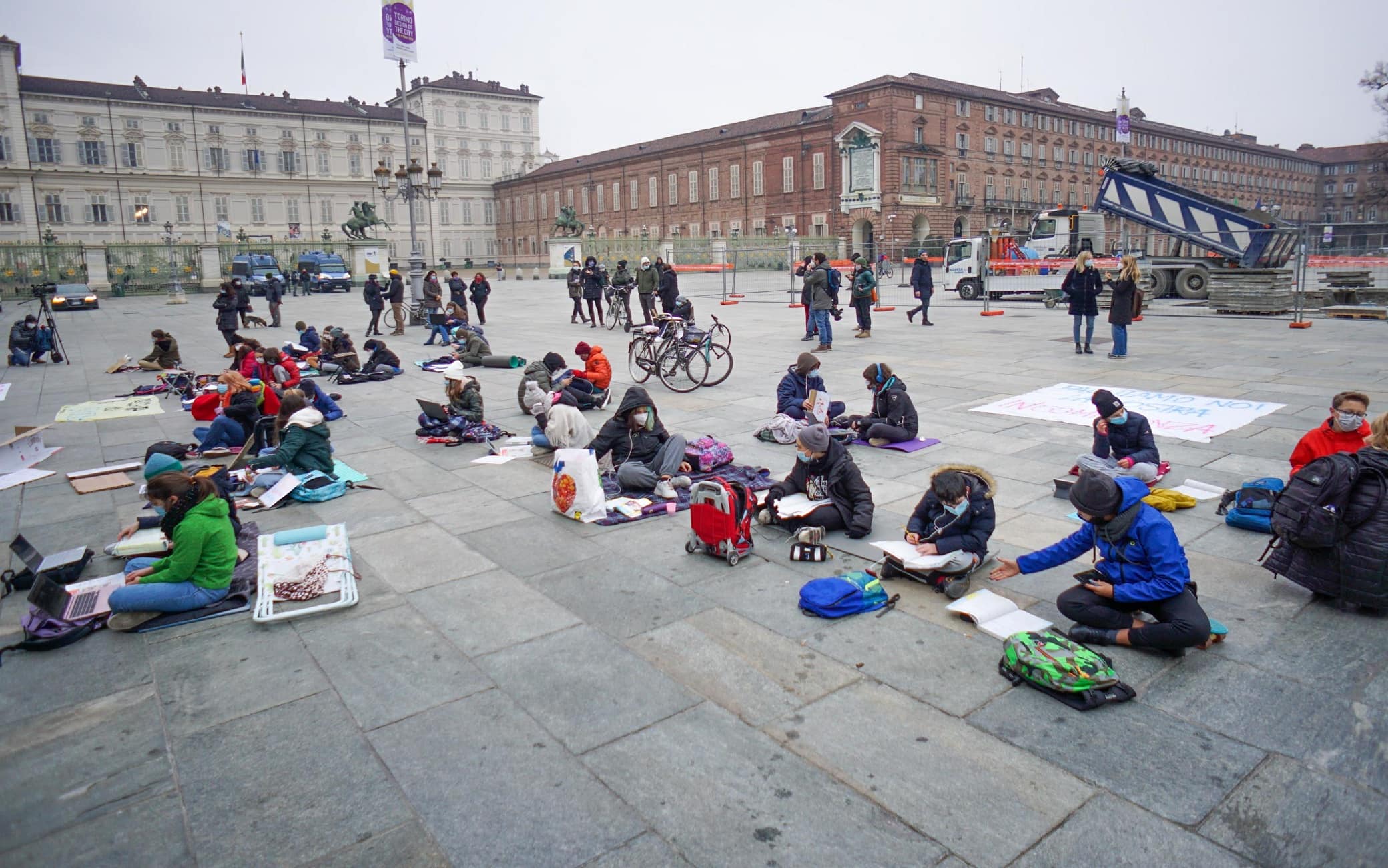 Middle school students demonstrate against distance teaching, in front of the Piedmont Region headquarter, in Castello square, Turin, 30 November 2020.  ANSA /JESSICA PASQUALON