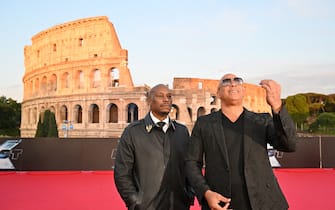 US actor Tyrese Gibson (L) and US actor Vin Diesel arrive for the Premiere of the film "Fast X", the tenth film in the Fast & Furious Saga, on May 12, 2023 at the Colosseum monument in Rome. (Photo by Alberto PIZZOLI / AFP) (Photo by ALBERTO PIZZOLI/AFP via Getty Images)