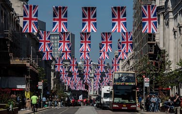 LONDON, ENGLAND - APRIL 29: Bunting for the coronation of King Charles III adorns Regent street on April 29, 2023 in London, England. The Coronation of King Charles III and The Queen Consort will take place on May 6, part of a three-day celebration. (Photo by Chris J Ratcliffe/Getty Images)
