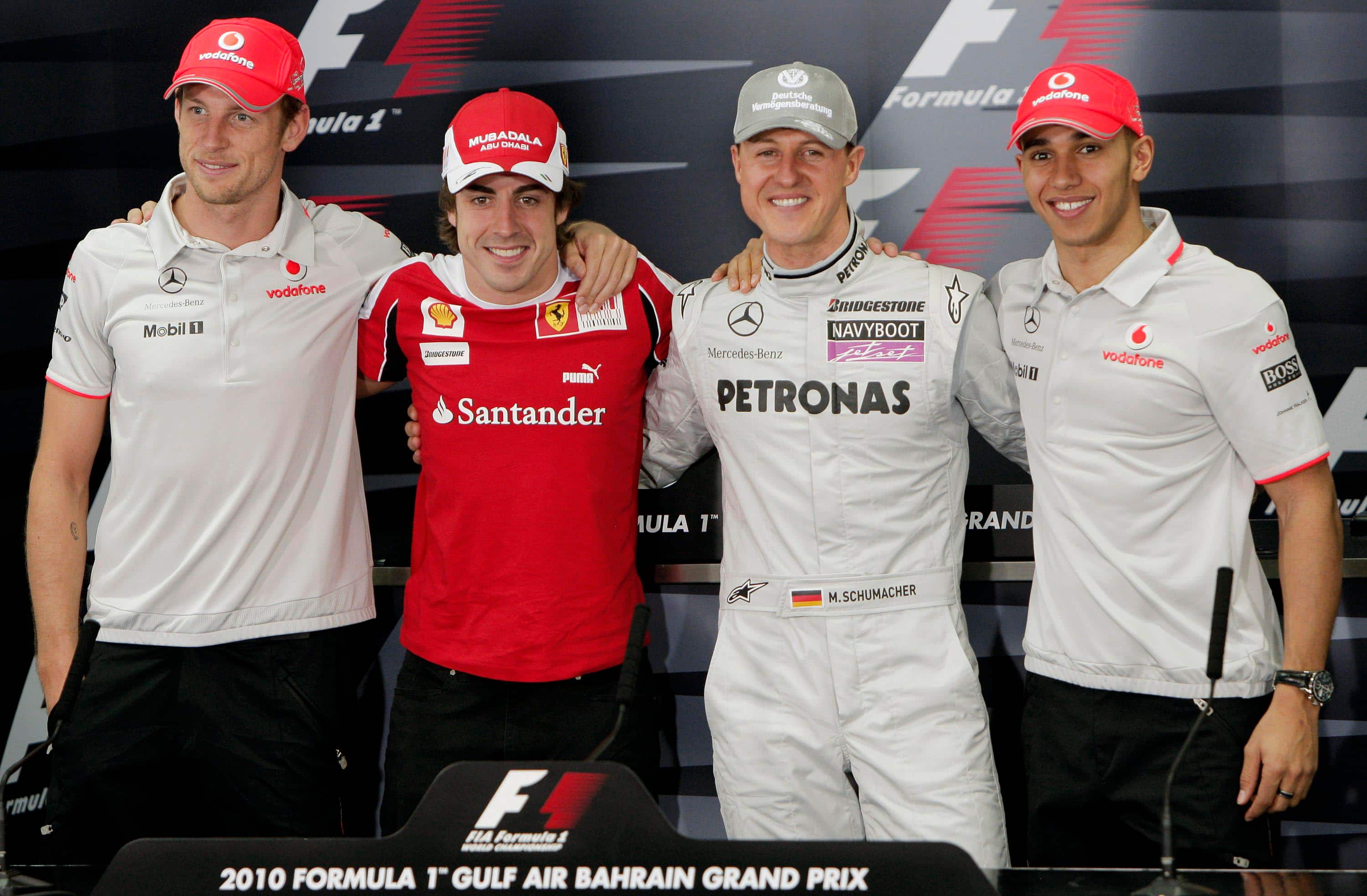 (L-R) British Formula One Champion Jenson Button of McLaren, Spanish Fernando Alonso of Scuderia Ferrari German Michael Schumacher of Mercedes GP and British Lewis Hamilton of McLaren pose after a press conference at Bahrain International Circuit in Sakhir, Bahrain, 11 March 2010. Seven-times Formula One champion Schumacher returns after three years when the 2010 Formula One season starts on 14 March with the Formula 1 Bahrain Grand Prix. Photo: JENS BUETTNER