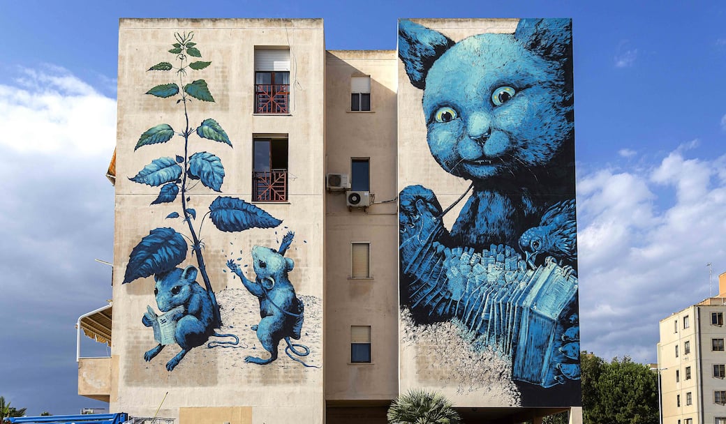 Ericailcane_mural_via_Schiavazzi_Massimiliano_Frau.jpeg