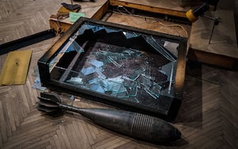 TOPSHOT - This photograph taken on December 22, 2022, shows a broken glass box in the looted museum halls at the Kherson Regional Museum, which specializes in local history and natural history in Kherson, amid the Russian invasion of Ukraine. - Russian military forces and civilians operating under their orders pillaged thousands of valuable artifacts and artworks from two museums, a cathedral, and a national archive in Kherson, before withdrawing after an 8-month occupation of the city, Human Rights Watch said on December 20, 2022. (Photo by Dimitar DILKOFF / AFP) (Photo by DIMITAR DILKOFF/AFP via Getty Images)
