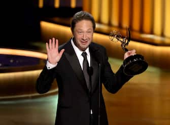LOS ANGELES, CALIFORNIA - JANUARY 15: Ebon Moss-Bachrach accepts the Outstanding Supporting Actor in a Comedy Series award for â  The Bear,â   onstage during the 75th Primetime Emmy Awards at Peacock Theater on January 15, 2024 in Los Angeles, California. (Photo by Kevin Winter/Getty Images)
