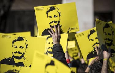 People hold signs depicting Giulio Regeni and reading ''365 days without Giulio'' as they attend a march in memory of the Italian researcher at Sapienza University on the first anniversary of his disappearance in Egypt, Rome, Italy, 25 January 2017. Italian President Sergio Mattarella on the same day called for cooperation to bring the killers of Regeni in Egypt to justice. 'Italy has mourned the killing of one of its studious young people, Giulio Regeni, without full light being shed on this tragic case for a year, despite the intense efforts of our judiciary and our diplomacy', Mattarella said on the first anniversary of Regeni's disappearance. 'We call for broader and more effective cooperation so that the culprits are brought to justice'. Guilio Regeni was an Italian PhD student researching the independent trade unions in Egypt, he disappeared on 25 January 2016 in Cairo, then his body was found in a ditch on Cairo-Alexandria road outside of Cairo on 03 February 2016 with signs of torture.  ANSA/MASSIMO PERCOSSI