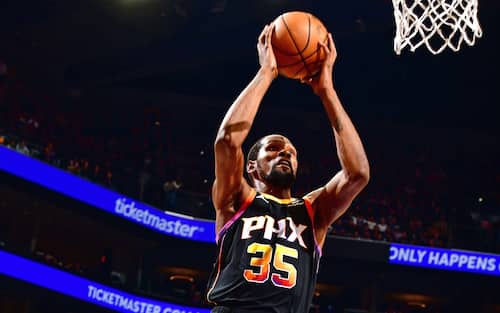 PHOENIX, AZ - DECEMBER 1: Kevin Durant #35 of the Phoenix Suns drives to the basket during the game against the Denver Nuggets on December 1, 2023 at Footprint Center in Phoenix, Arizona. NOTE TO USER: User expressly acknowledges and agrees that, by downloading and or using this photograph, user is consenting to the terms and conditions of the Getty Images License Agreement. Mandatory Copyright Notice: Copyright 2023 NBAE (Photo by Barry Gossage/NBAE via Getty Images)