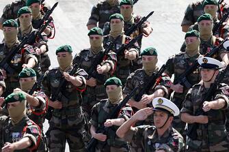 Marine Force fusiliers and "Kieffer commando" march during the Bastille Day military parade along the Avenue Foch with the Arc de Triomphe in the background in Paris on July 14, 2024. (Photo by Ludovic MARIN / AFP) (Photo by LUDOVIC MARIN/AFP via Getty Images)