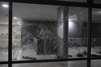 BRASILIA, BRAZIL - JANUARY 8: A view of a broken window at the Palacio do Planalto (the official workplace of the president of Brazil) following a protest by supporters of Brazil's former President Jair Bolsonaro against President Luiz Inacio Lula da Silva, in Brasilia, Brazil, on January 8, 2023. (Photo by Mateus Bonomi/Anadolu Agency via Getty Images)