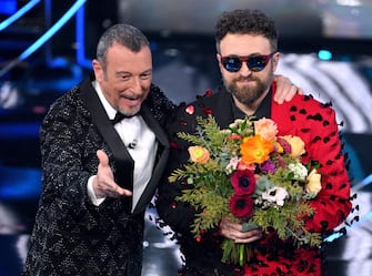 Sanremo Festival host and artistic director Amadeus (L) and Italian singer Dargen D'Amico on stage at the Ariston theatre during the 74rd Sanremo Italian Song Festival, Sanremo, Italy, 10 February 2024. The music festival will run from 06 to 10 February 2024.  ANSA/ETTORE FERRARI