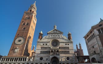 Cremona, Lombardy, northern Italy. The Cathedral Square with the cathedral, the Torrazzo bell tower, and the baptistery medieval monuments
