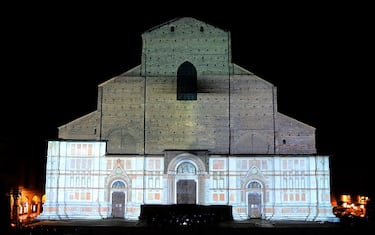 BOLOGNA, ITALY - SEPTEMBER 15: A videomapping projection show about the historiacal architecture projects of the unfinished Bologna's San Petronio Cathedral "The Square Light Up" with concert at Piazza Maggiore on September 15, 2022 in Bologna, Italy. (Photo by Roberto Serra - Iguana Press/Getty Images)