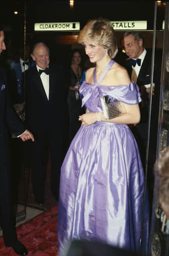 Princess Diana, wearing a Donald Campbell gown, attending a performance of 'Hayfever' at the Queen's Theatre in London, November 1983. (Photo by Jayne Fincher/Getty Images)
